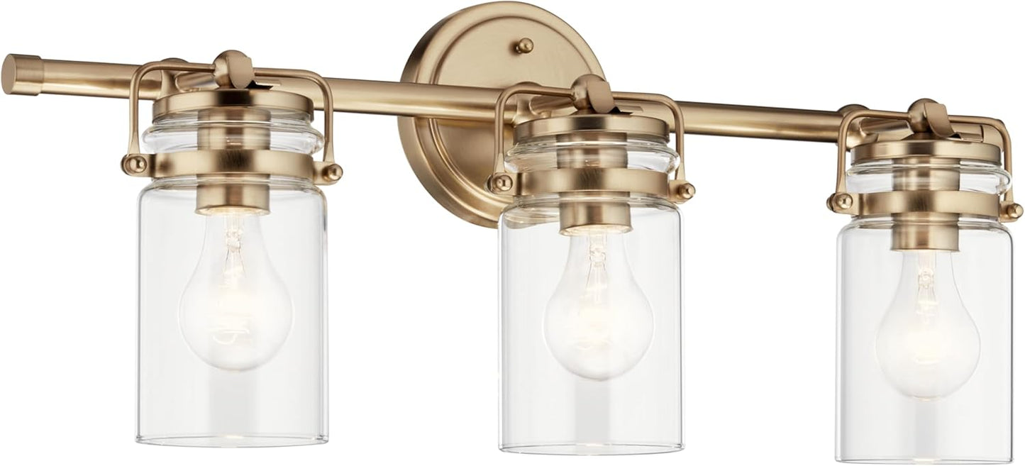 Kichler Brinley 24" 3-Light Bathroom Vanity Light Fixture with Clear Glass in Champagne Bronze, Modern Farmhouse Mason Jar Style for Mirror Lighting (24" W x 10.25" H), 45689CPZ